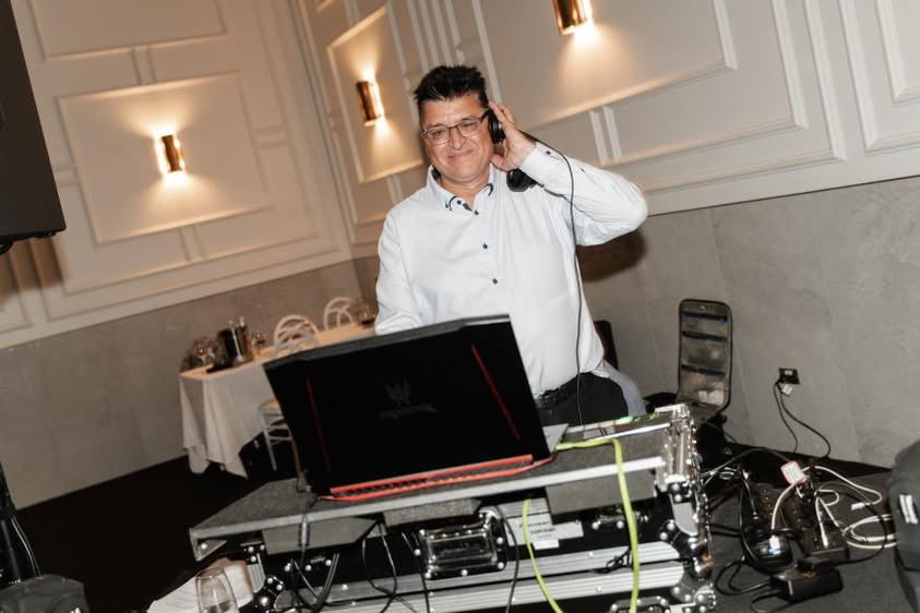 DJ Eric at the decks during a reception